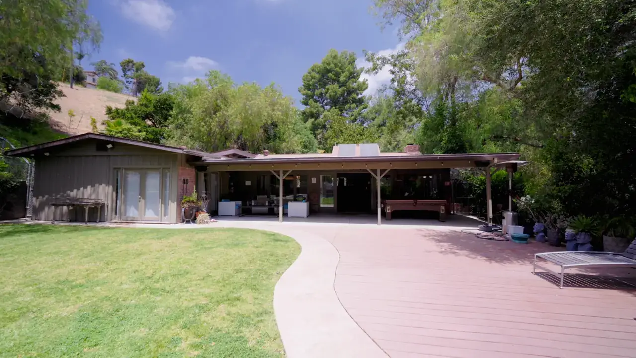 The back patio, lawn and covered lounge at My2Cents Recovery